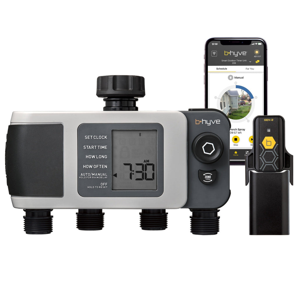 Dual-outlet digital hose timer beside phone and remote.