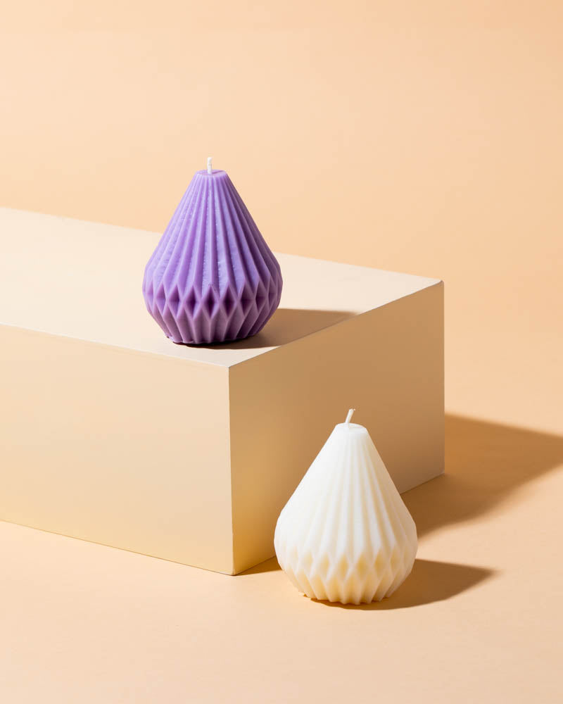 Purple and white teardrop-shaped candles.