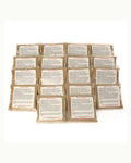 Multiple brown tea packets arranged together.