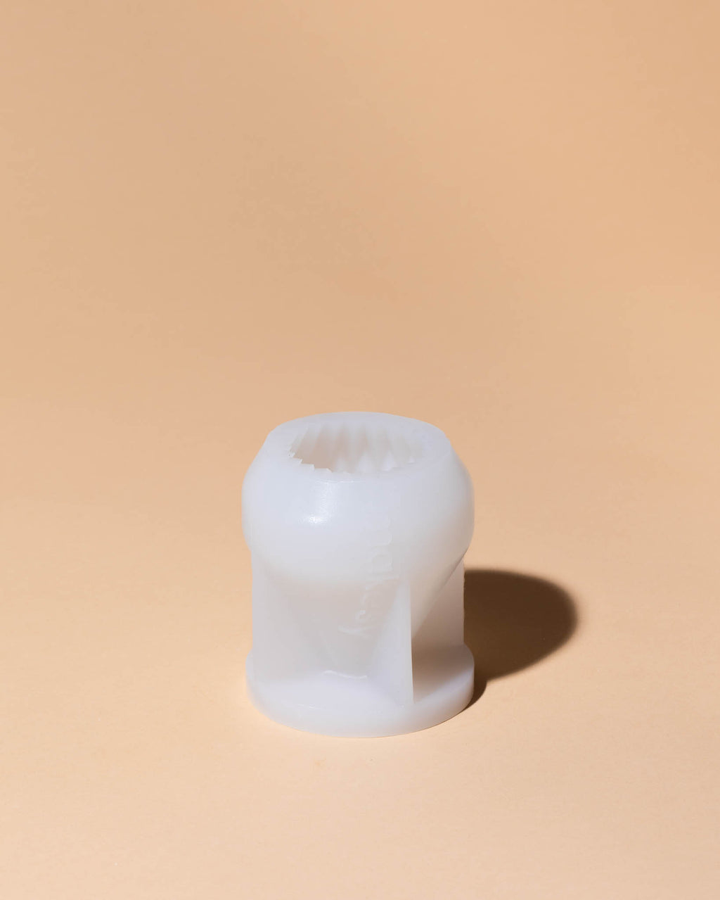 Small white curved mold.