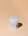 Small white curved mold.