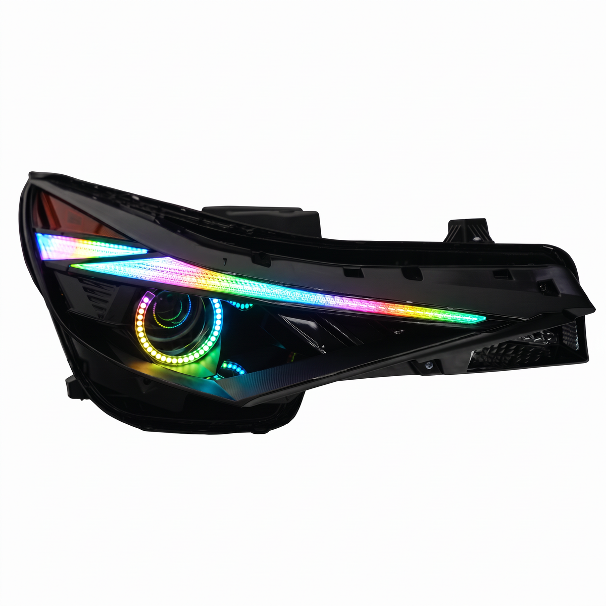 Headlight assembly with green and blue illuminated rings.