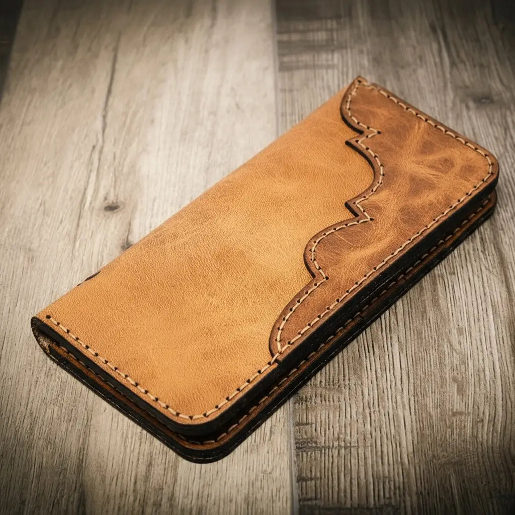 Closed tan wallet with wavy stitched edge.
