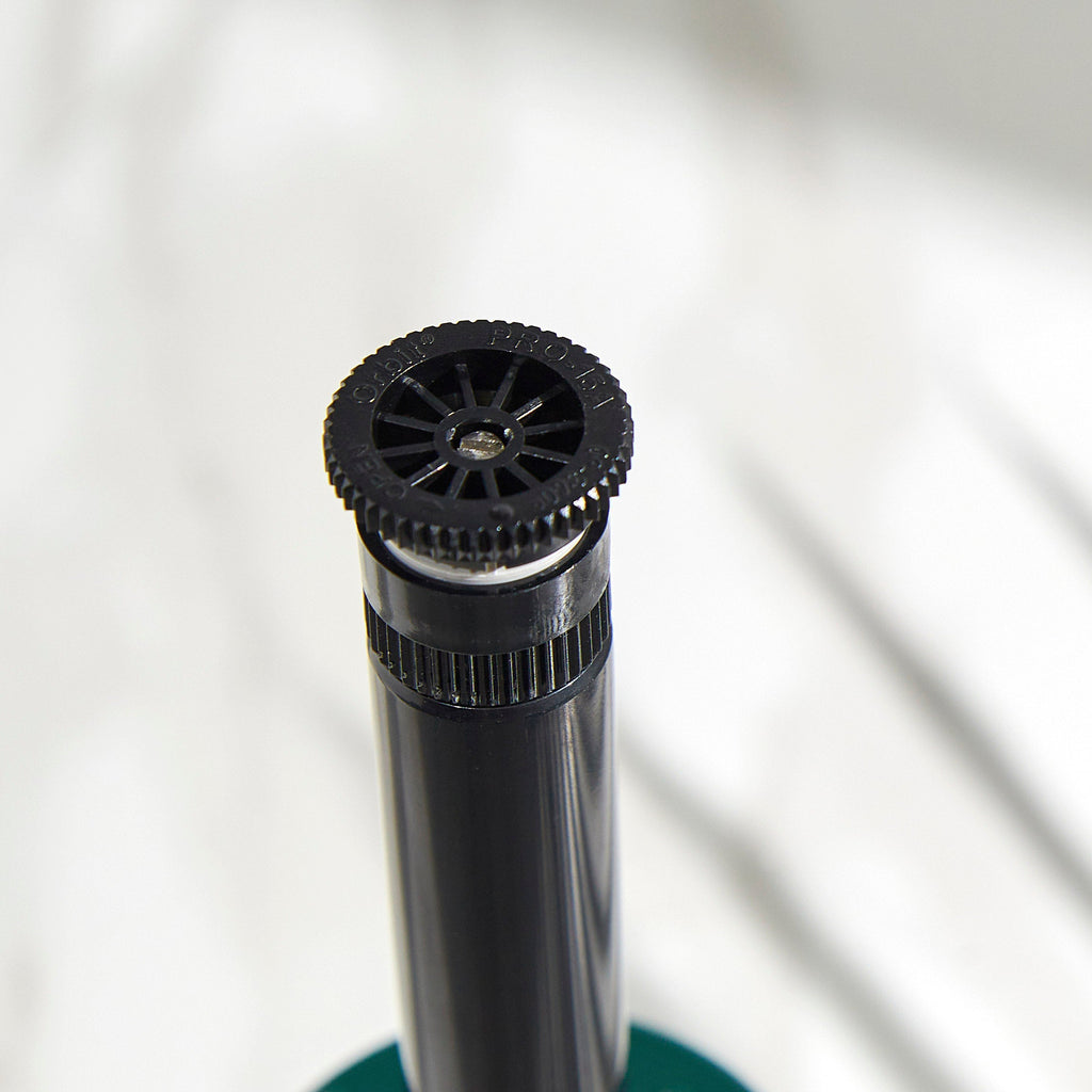 Close-up of sprinkler spray head.