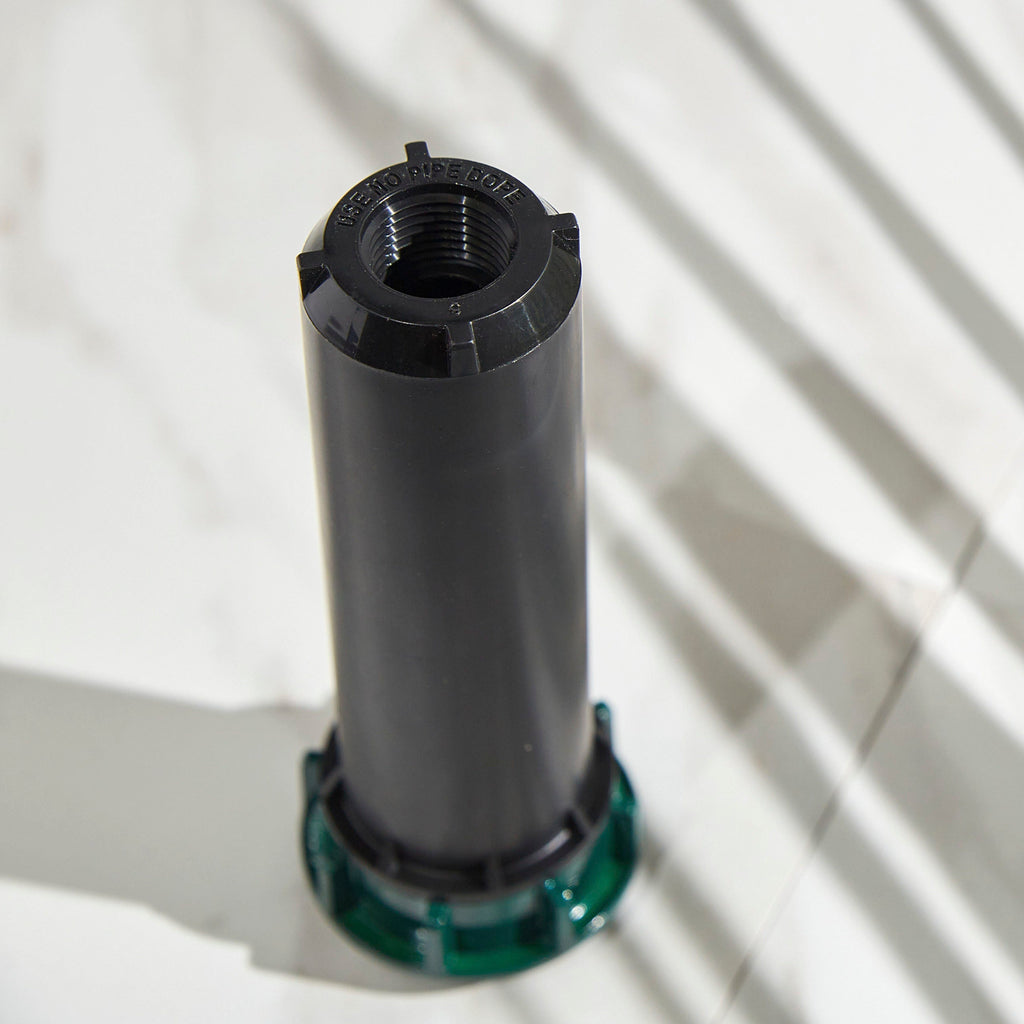 Close-up of retracted sprinkler head.