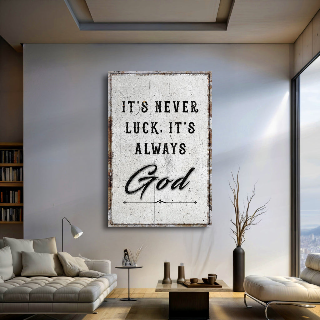 Distressed white It's never luck. It's always God canvas above a sofa.