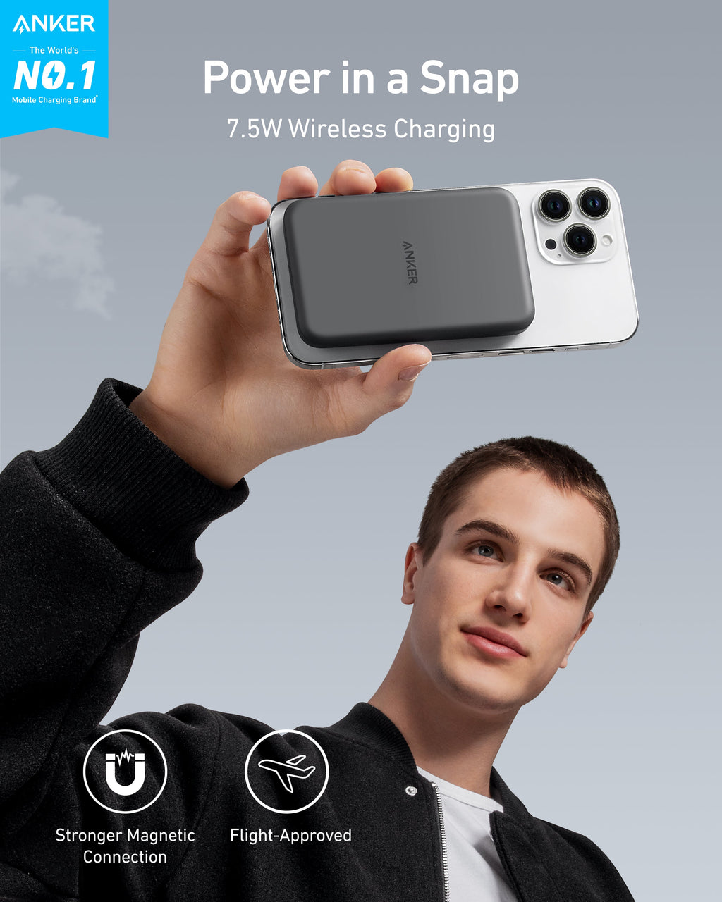 Person using black magnetic power bank.
