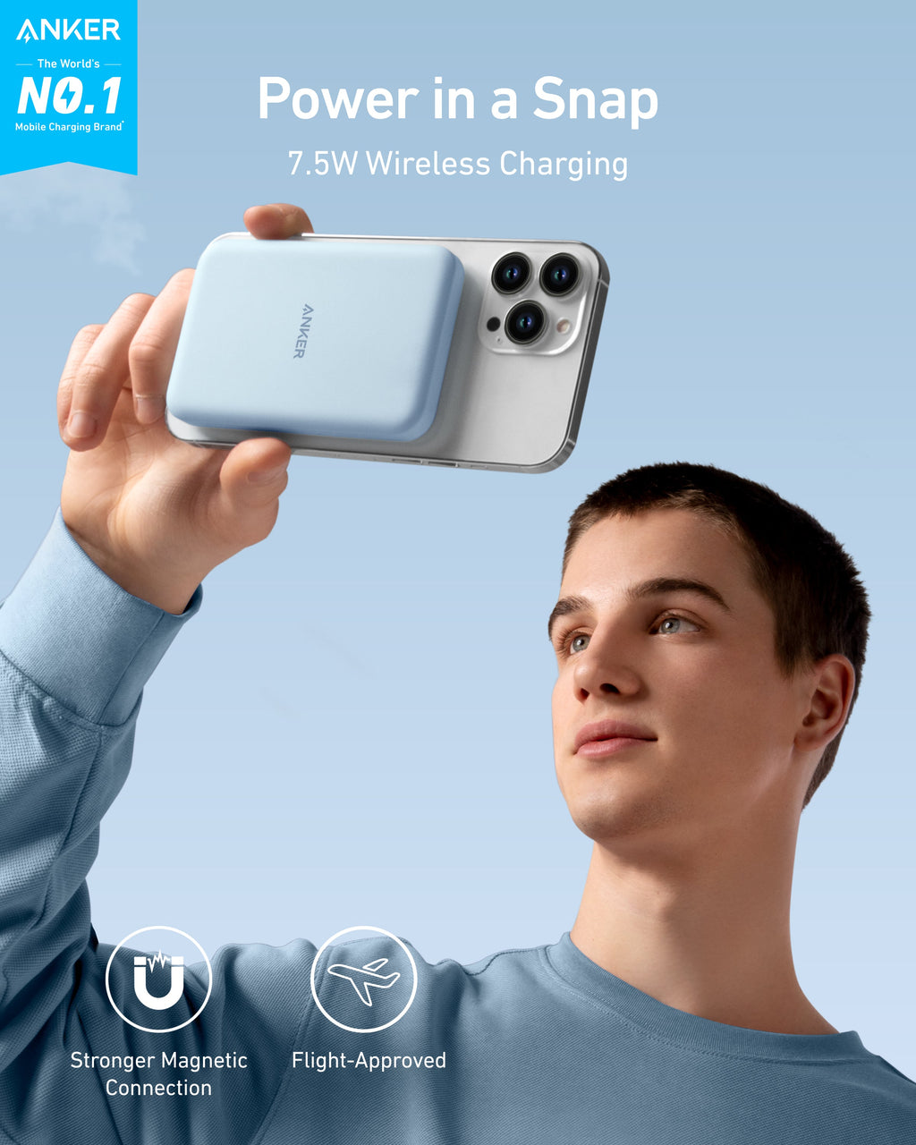 Person using blue magnetic power bank.