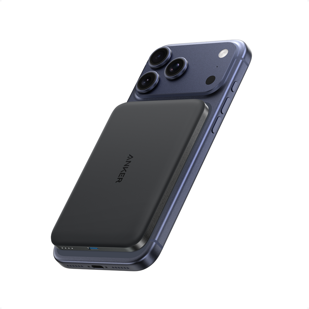 Black power bank attached to phone.