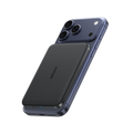 Black power bank attached to phone.