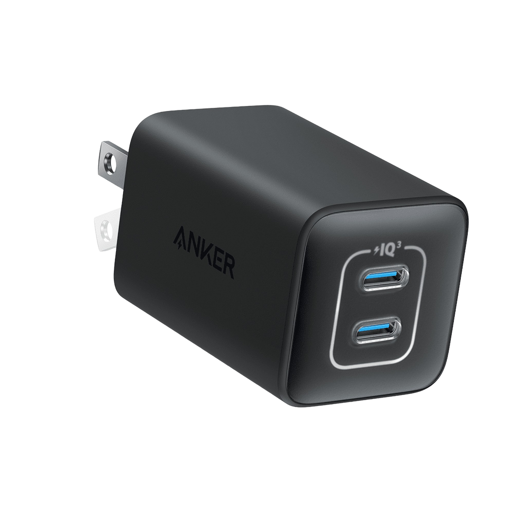 Black dual-port wall charger.