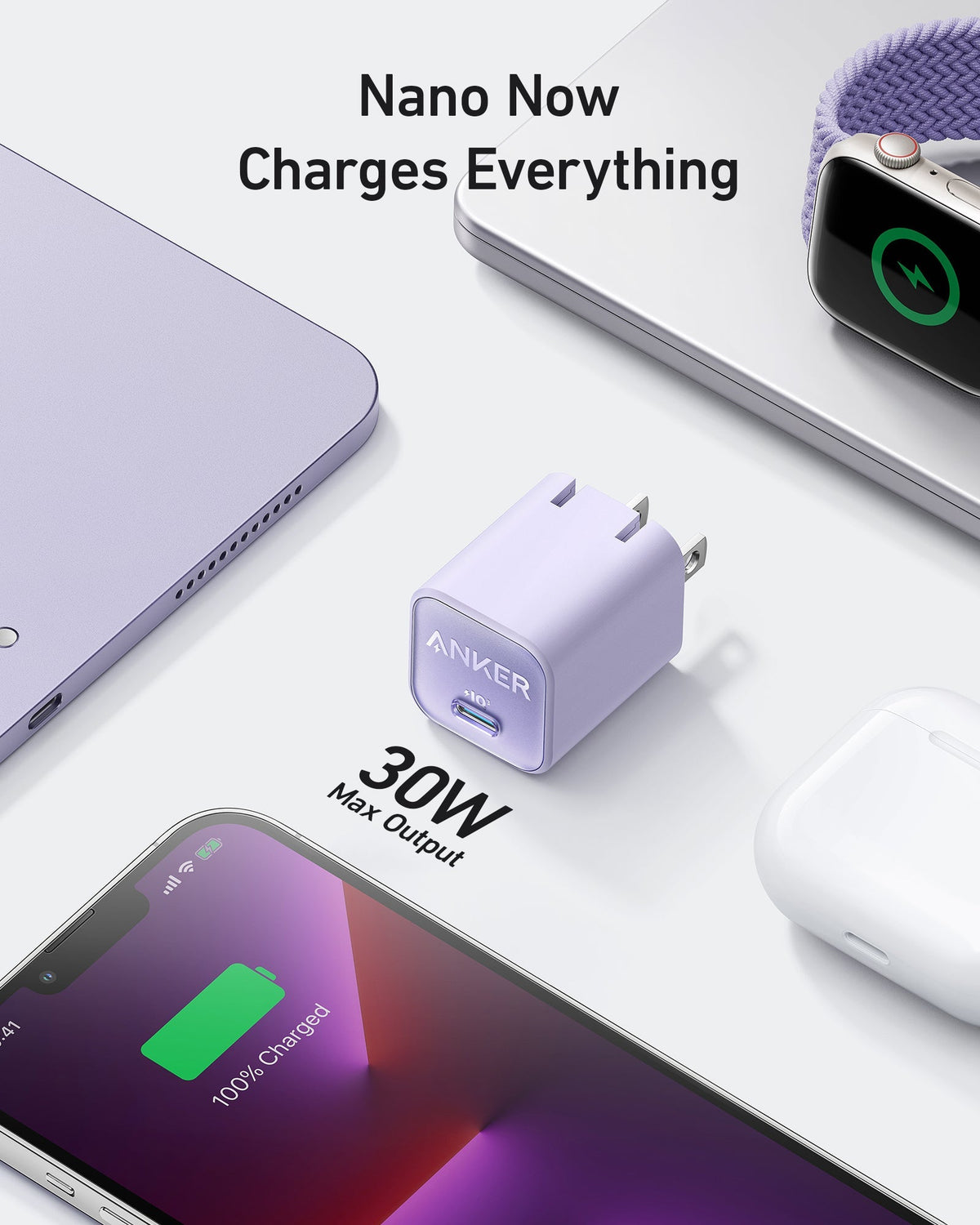 Purple charger beside laptop.