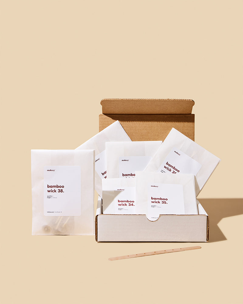 Small white sachets beside open box.