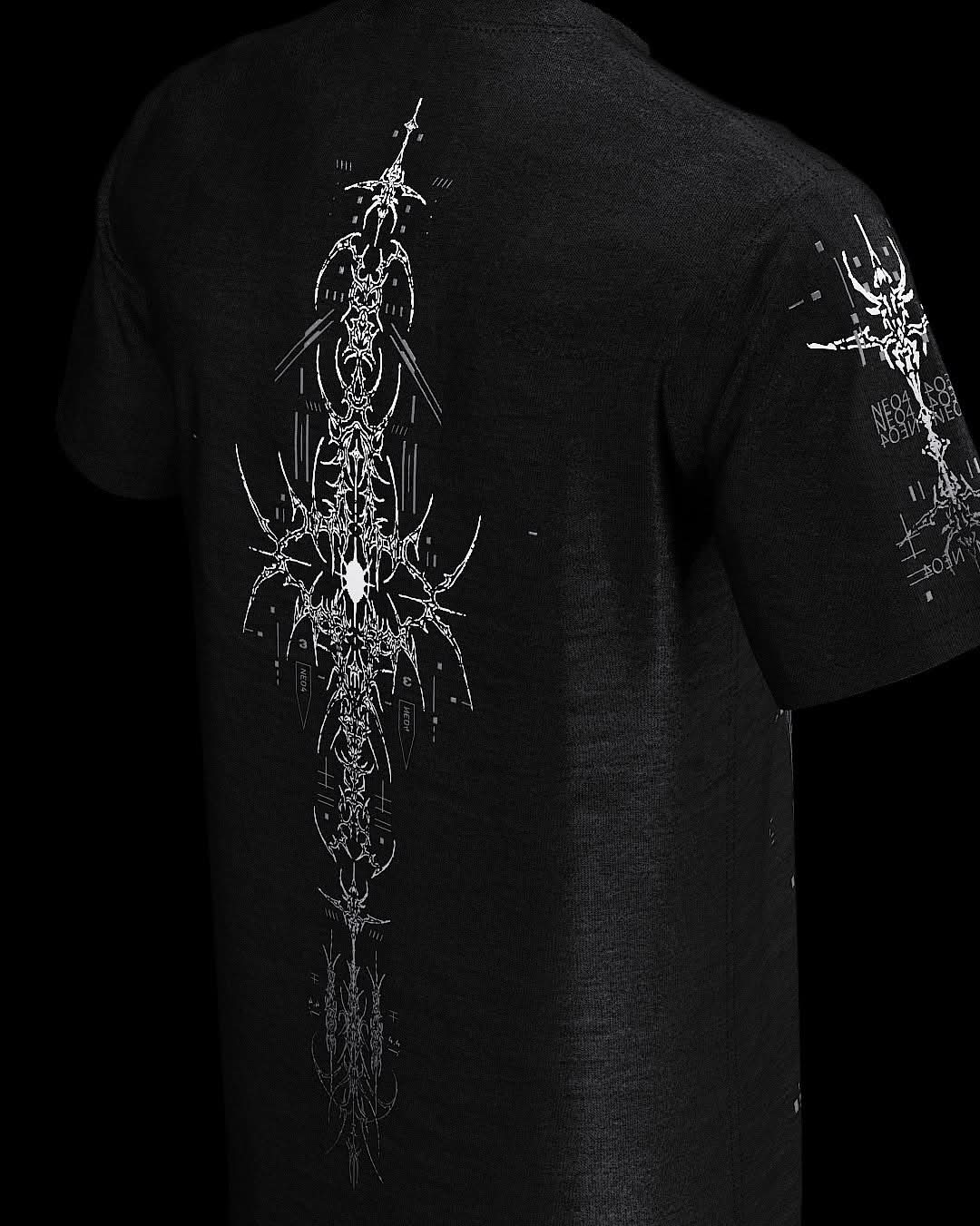 Rear view of black T-shirt with narrow gray ornamental emblem.