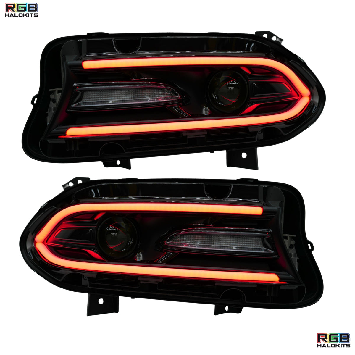 Pair of headlights with orange illuminated outlines.