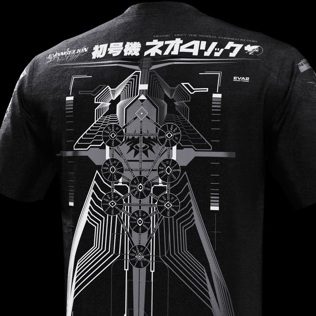 Close-up of upper rear technical artwork on black T-shirt.