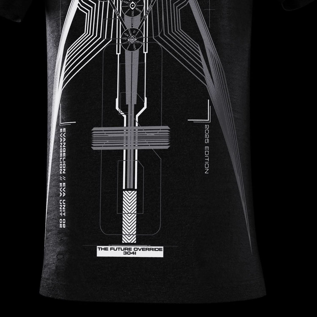 Close-up of lower rear technical artwork on black T-shirt.
