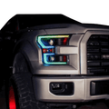 Close-up of multicolor headlight strips on pickup.