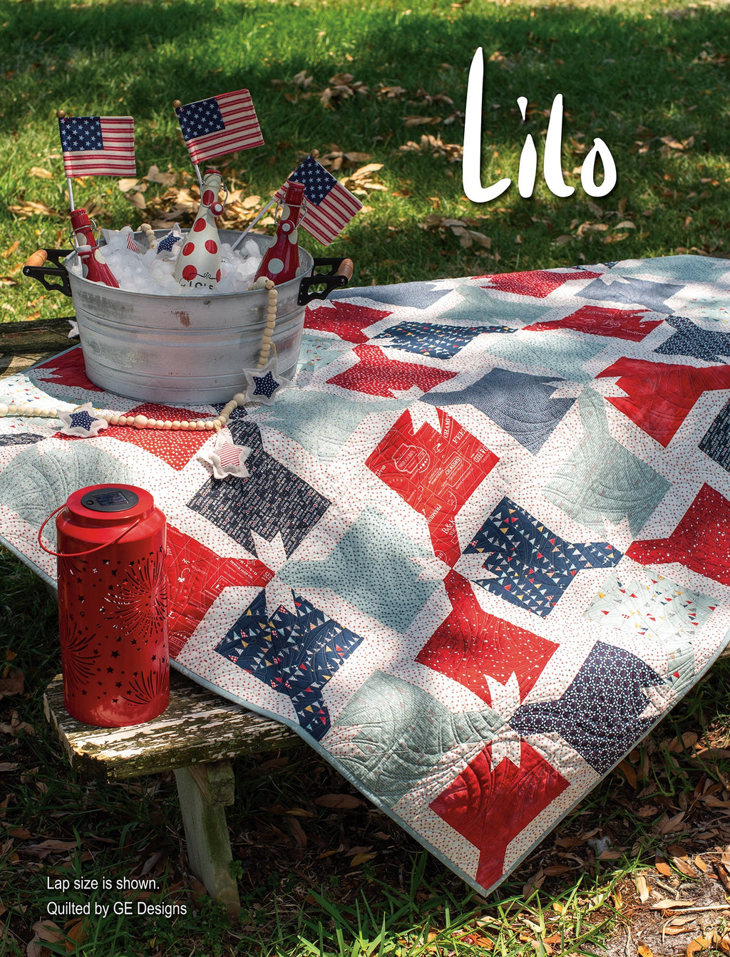 Red, gray and white quilt labeled Lilo.