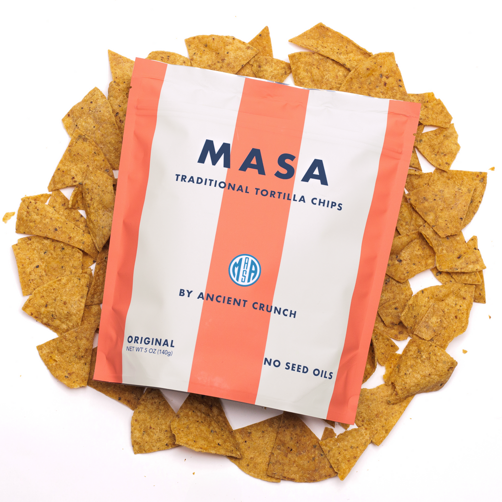 Masa snack bag surrounded by chips.