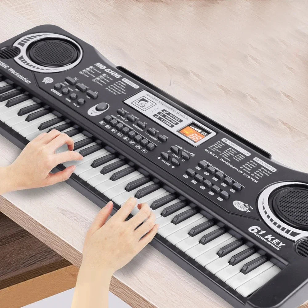Black electronic keyboard with microphone.