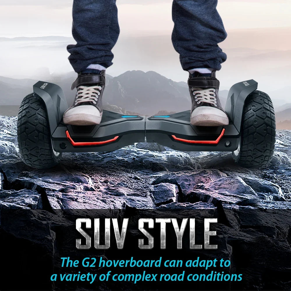 Person standing on hoverboard outdoors.