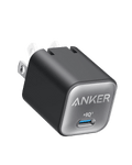 Dark gray compact wall charger.