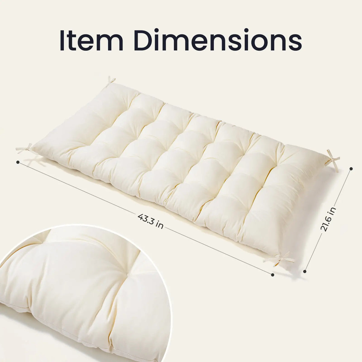 Cream tufted cushion with dimensions and a detail inset.
