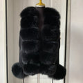 Long black fluffy vest.
