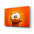 Wall art depicting Garfield's face on an orange background on white background.