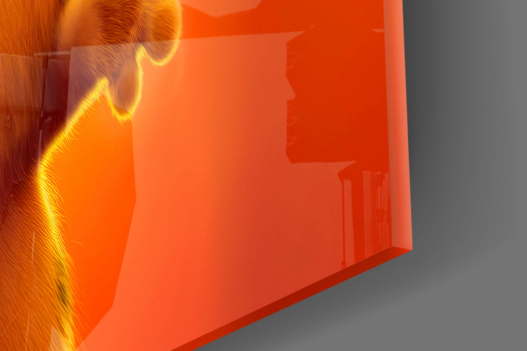 Close-up of the edge of wall art depicting Garfield's face on an orange background.