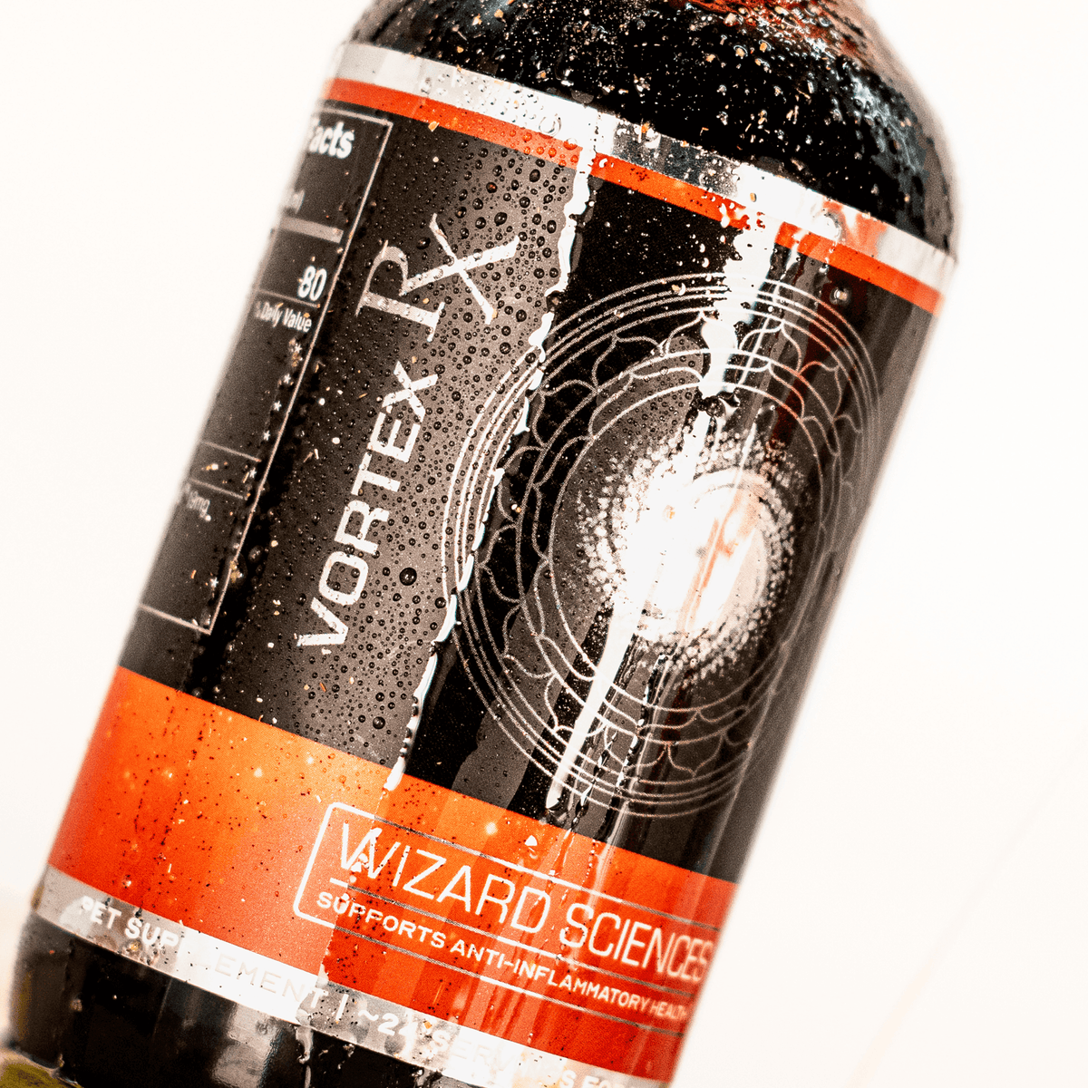 Angled amber bottle with white spiral label.