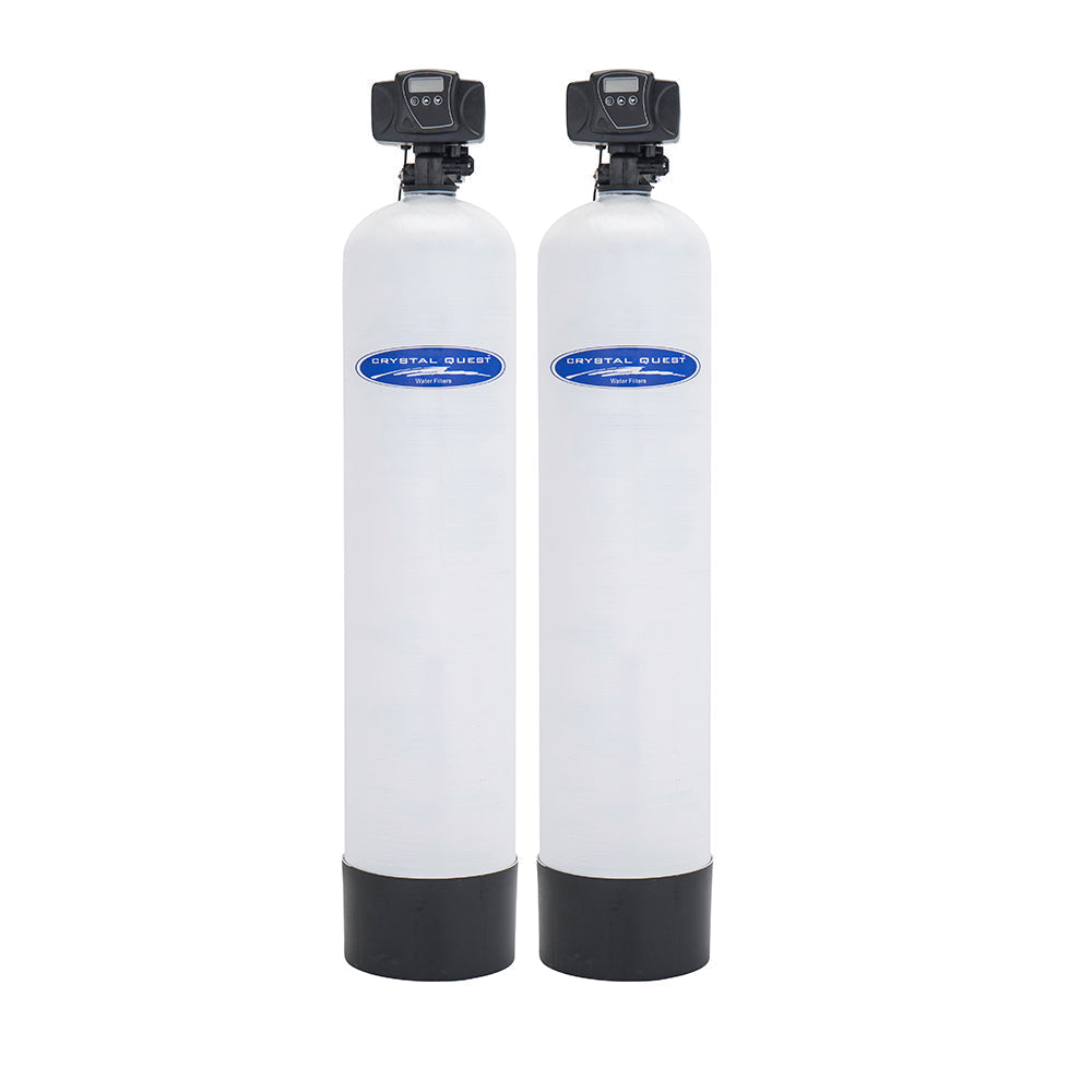 Two white filter cylinders with black valves.
