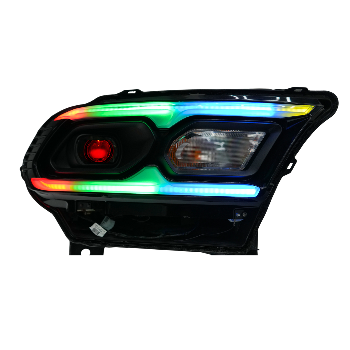 Single headlight assembly with rainbow strips and red center light.