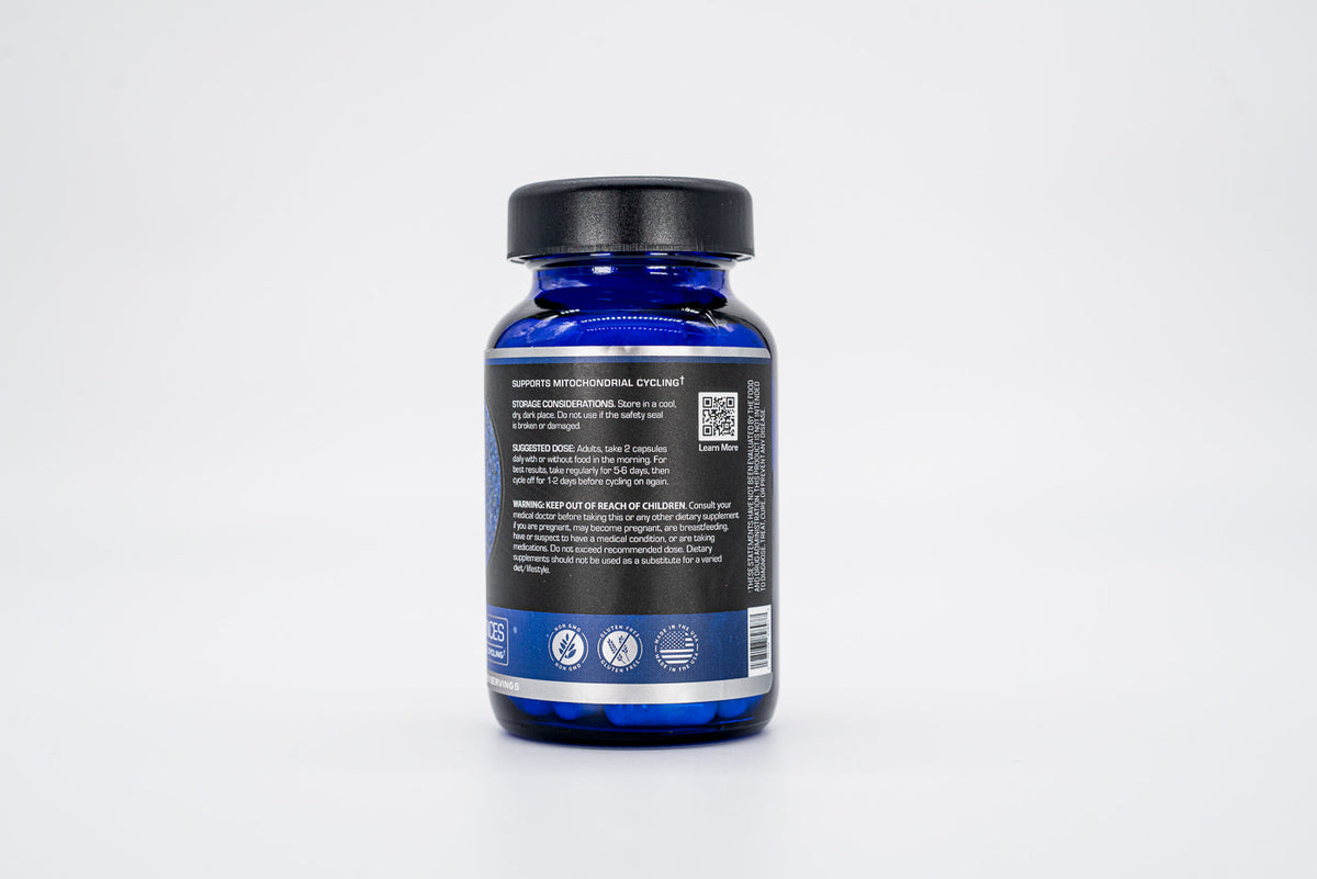 Small blue bottle with circular design on label.