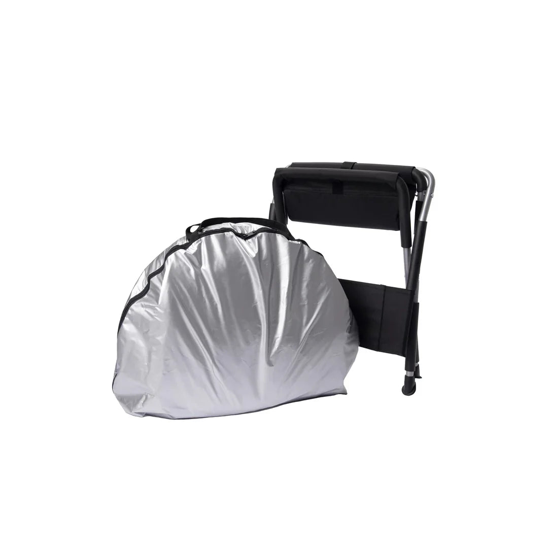 Folded fabric enclosure beside black chair.